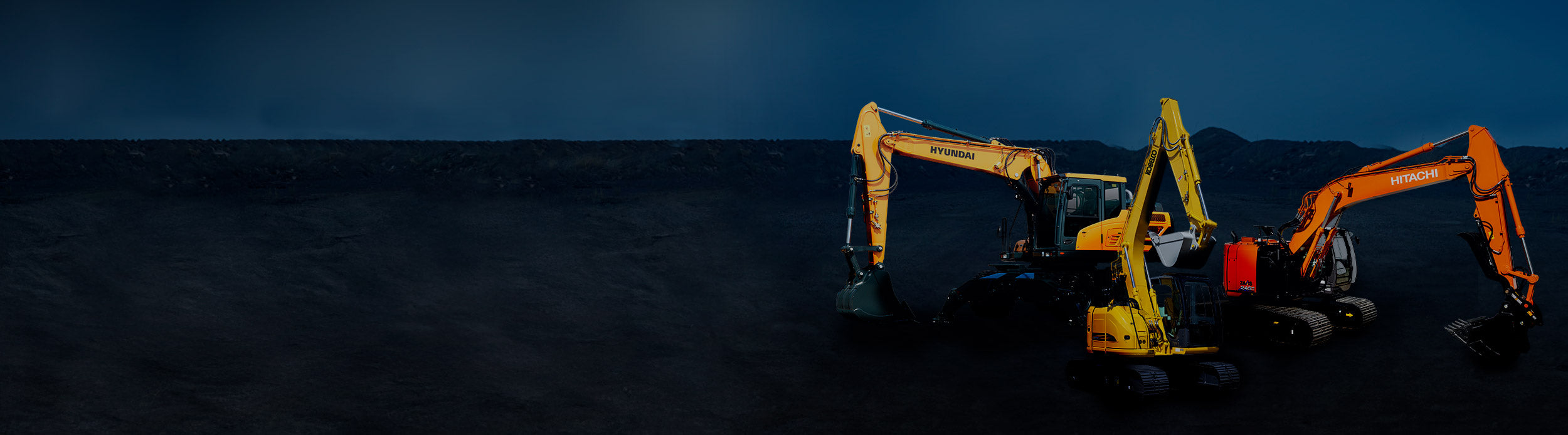 Three excavators on a dark background