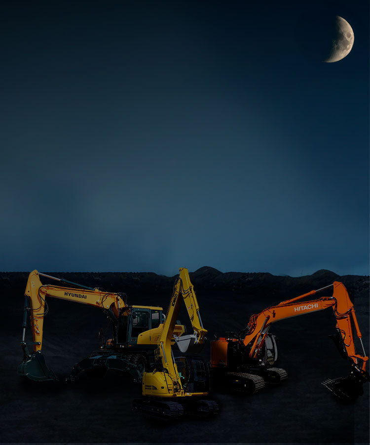 Three excavators on a dark landscape with a moonlit sky